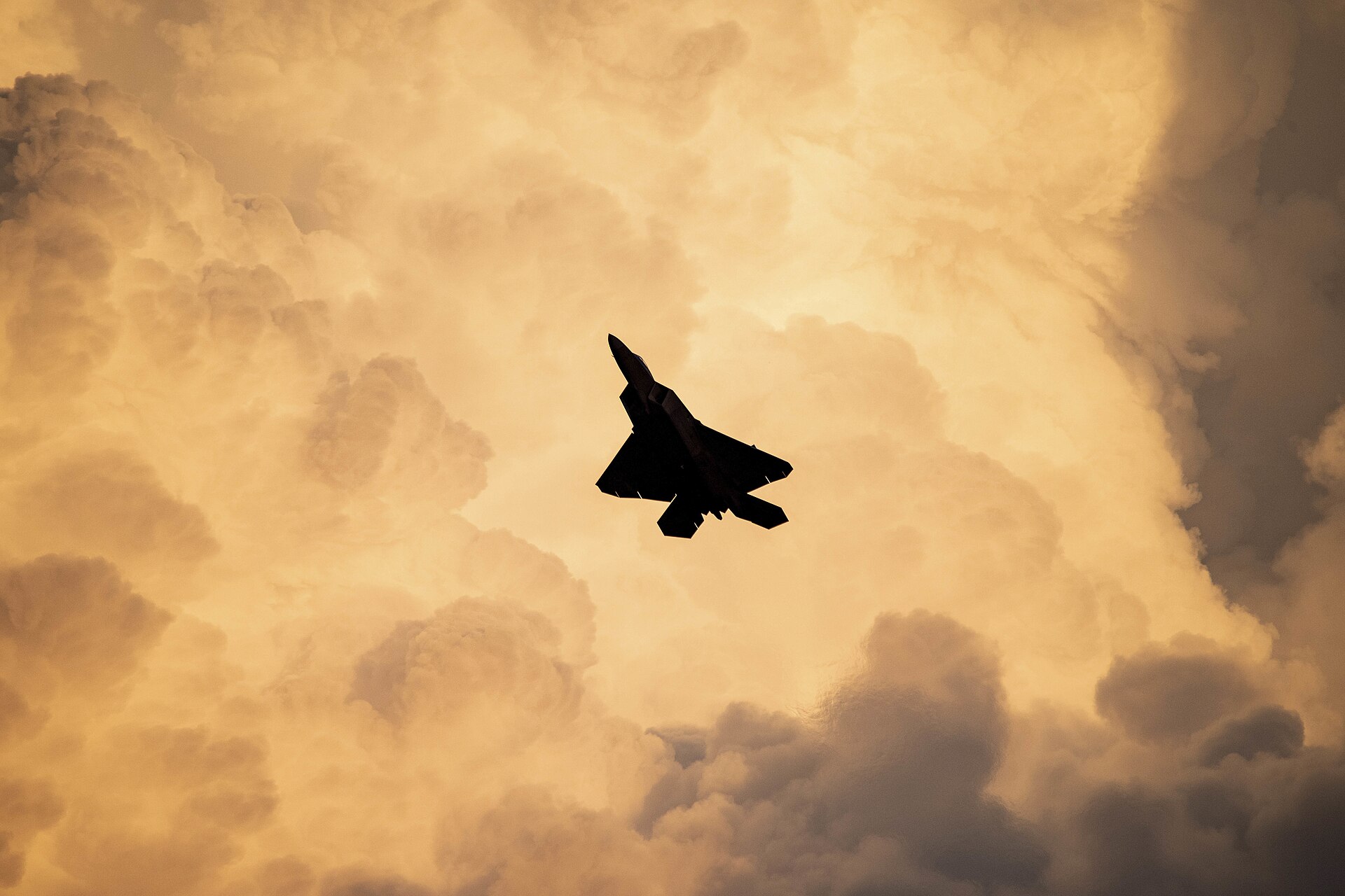 Military fighter jet in flight